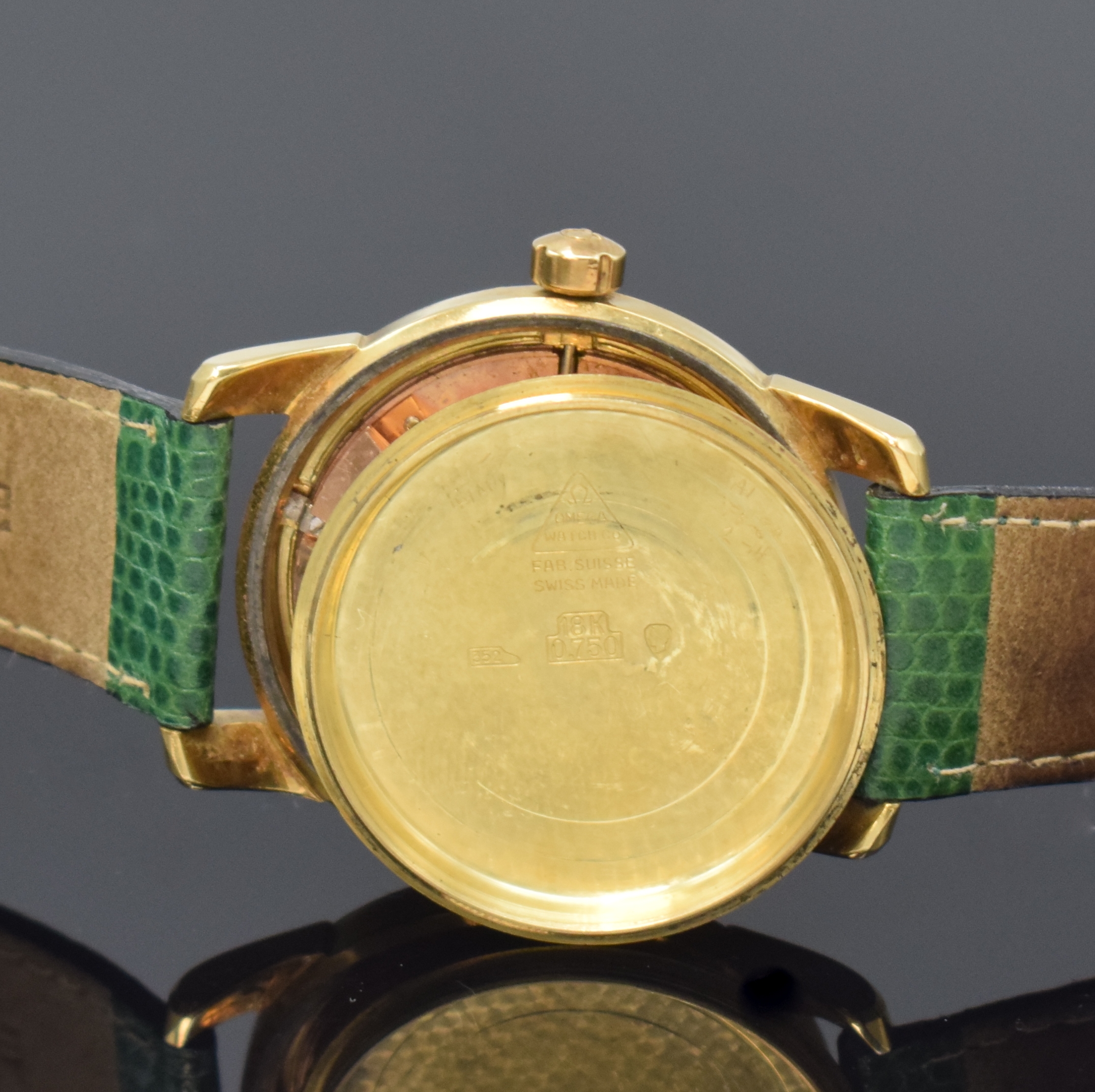 Detail e: OMEGA Seamaster Armbanduhr Referenz 2577SC in GG 750/000, Schweiz um 1953, Hammerautomatik, verschr. Geh., verg. Lünette später, silb. Zifferbl. ...