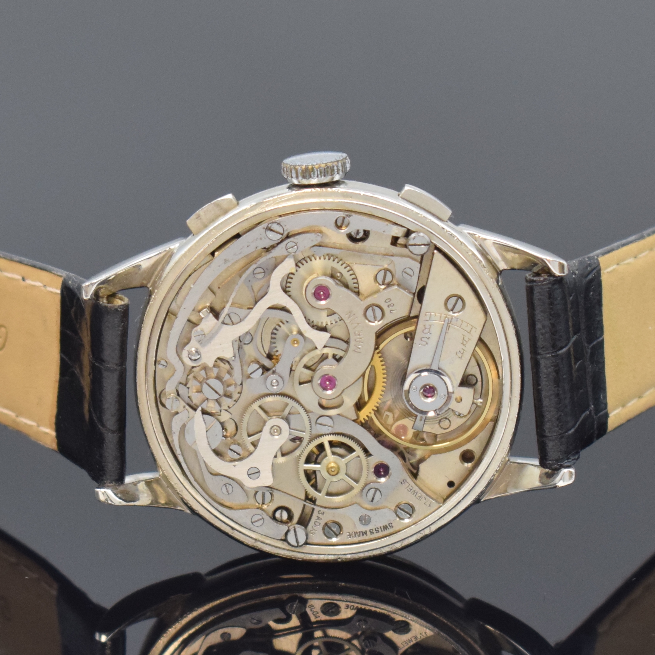 Detail d: MARVIN Kaliber Valjoux 22 Armbandchronograph in Stahl, Schweiz um 1945, Handaufzug, 3- tlg. Geh., Boden u. Glasrand aufgedr., silb. Zifferbl. rest., ...