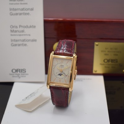 Image 26762754 - ORIS nearly mint to 90 pieces limited wristwatch with moon phase and date in 18k pink gold, Switzerland around 1994, self winding, rectangular case with number 30/90 on the bezel, case back screwed-down 4-times, original leather strap with original 18k pink gold buckle, silvered structured dial, pink gilded indices and numerals, moon phase at 6, central date, correction from both by winding crown, calibre ETA 2685, 25 jewels, original box and papers, measures approx. 38 x 26 mm, overhaul recommended at buyer's expense, condition 1