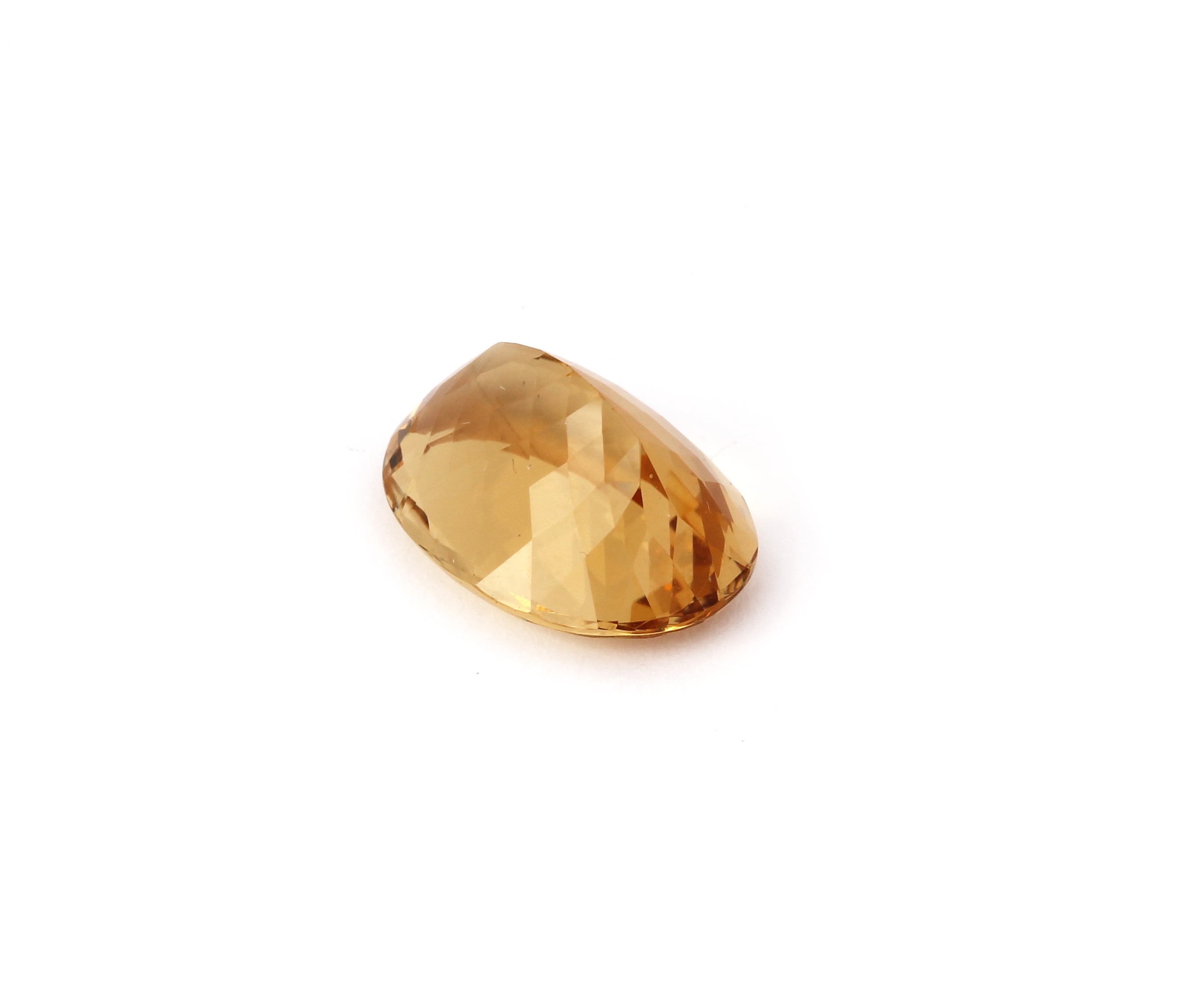 Detail a: Loser Gold Beryl, 11.93 ct, ovalfacett., ca. 17.89 x 13.05 x 9.13 mm, mit ALGT- Expertise