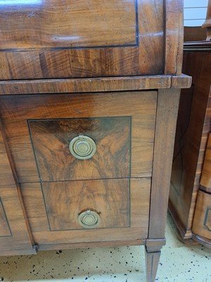 26764538k - Secretary, Louis-Seize, France, around 1780, walnut veneer, partly walnut root, 2 drawers at the bottom, one drawer and 2 blind drawers, roller flap with pull-out writing board, interior division with another 4 drawers, brass fittings, approx. 116x113x52 cm, condition 2-3