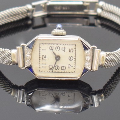26764811a - Art Deco diamonds set platinum wristwatch, Switzerland around 1930, manual winding, case floral engraved, hinge case back dent, jeweled crown, silvered dial with Arabic numerals, blackened hands, calibre AS 1051, 15 jewels, needs to be overhauled, condition 3