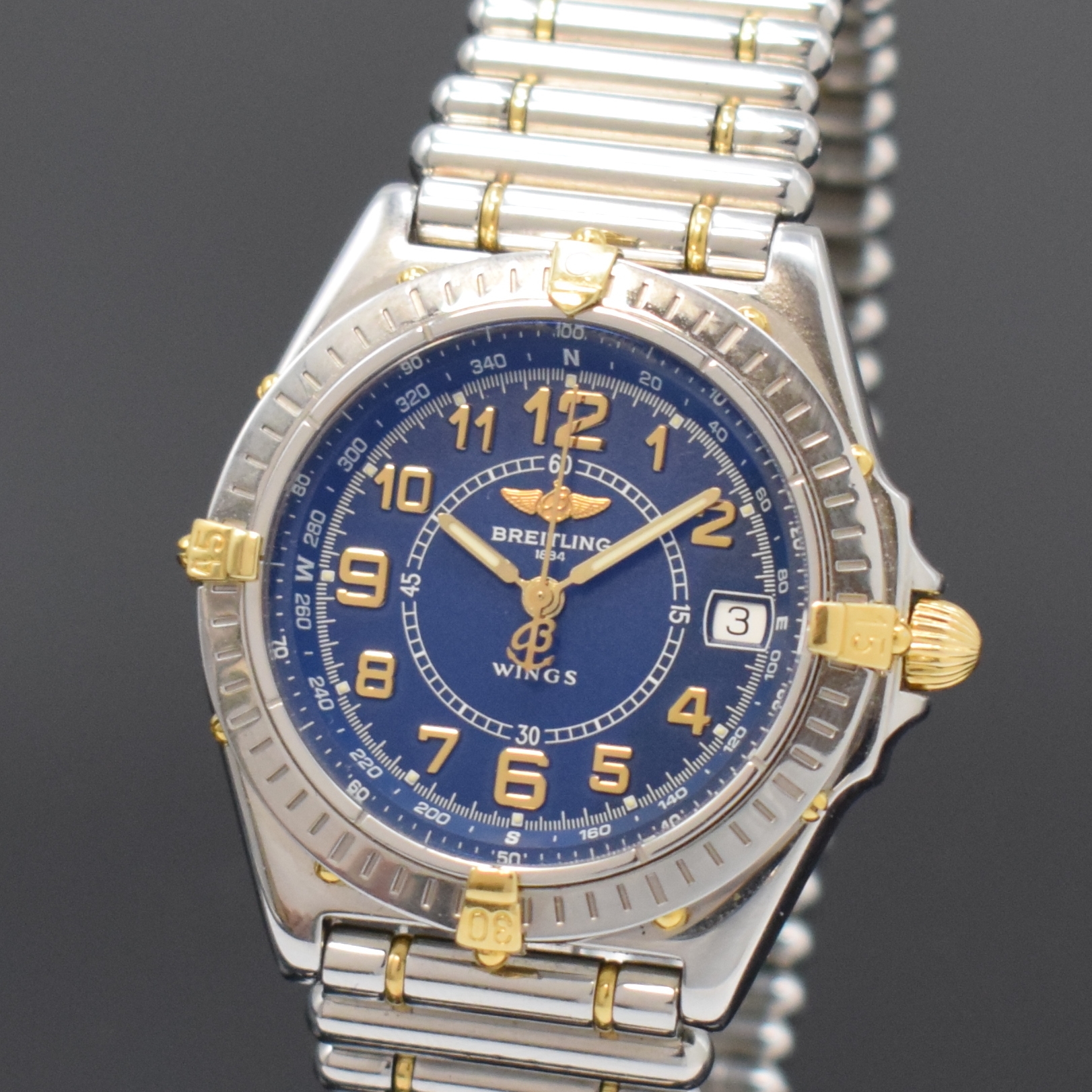 Detail a: BREITLING Herrenarmbanduhr Modellserie Wings Referenz B66050, Schweiz um 1998, quarz, z. T. verg. Edelstahlgeh. inkl. orig. Gliederband m. dopp. ...
