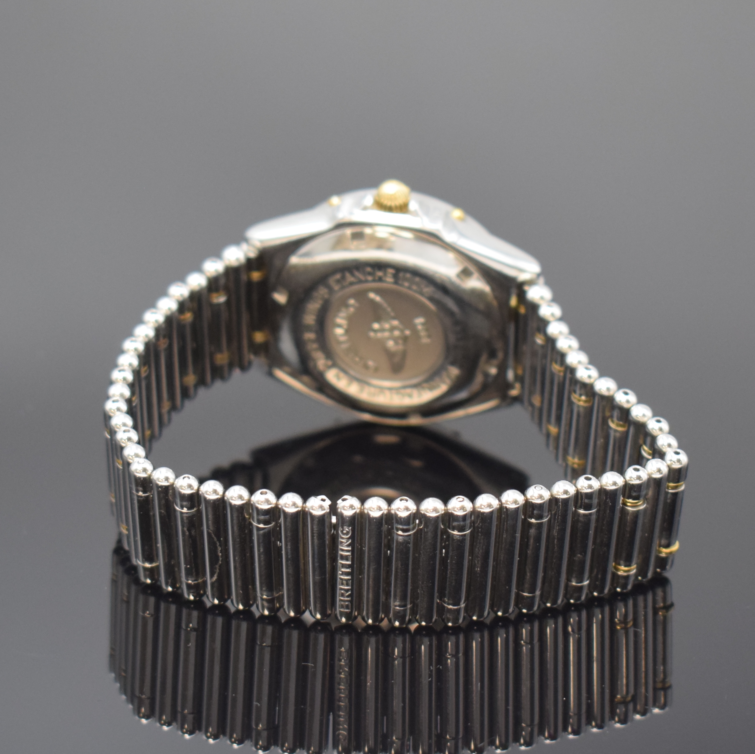 Detail b: BREITLING Herrenarmbanduhr Modellserie Wings Referenz B66050, Schweiz um 1998, quarz, z. T. verg. Edelstahlgeh. inkl. orig. Gliederband m. dopp. ...