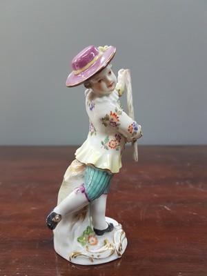 26765613b - Porcelain figure, Meissen, early 20th century, on staff and hat slightly dam., porcelain, colorfully painted, gold decoration, height approx. 11.5 cm