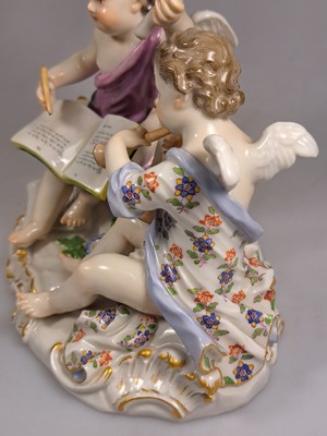 26765618m - Porcelain group, Meissen, around 1890/1900, allegory of poetry, designed by Johann Joachim Kaendler, two musical cupids, model no. 2464, fine polychrome painting, gold decoration, pommel swords, approx. 12.5 x 16 cm