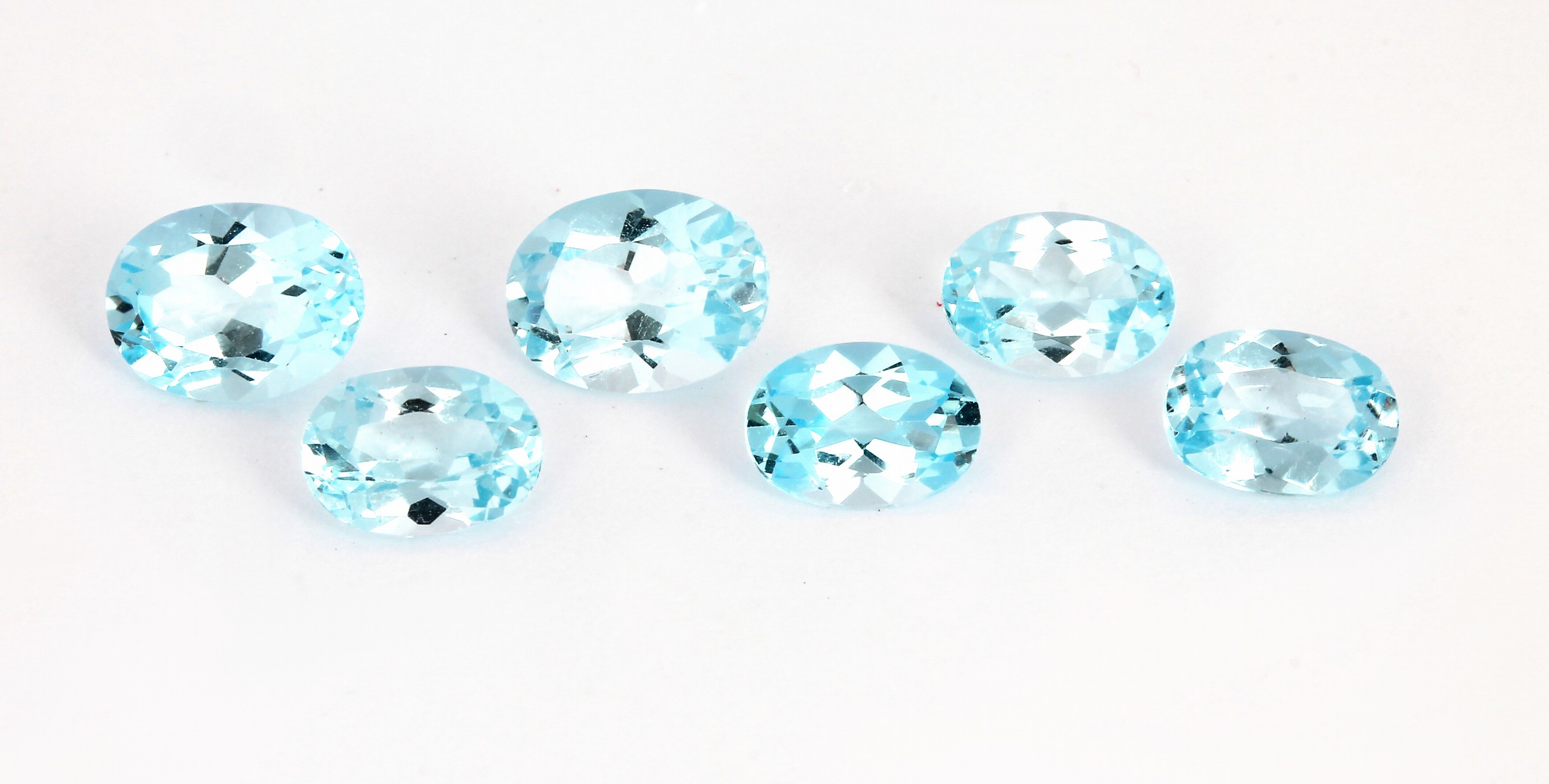 Detail b: Lot 6 lose Aquamarine, ca. 6.76 ct, ovalfacett. in versch. Größen