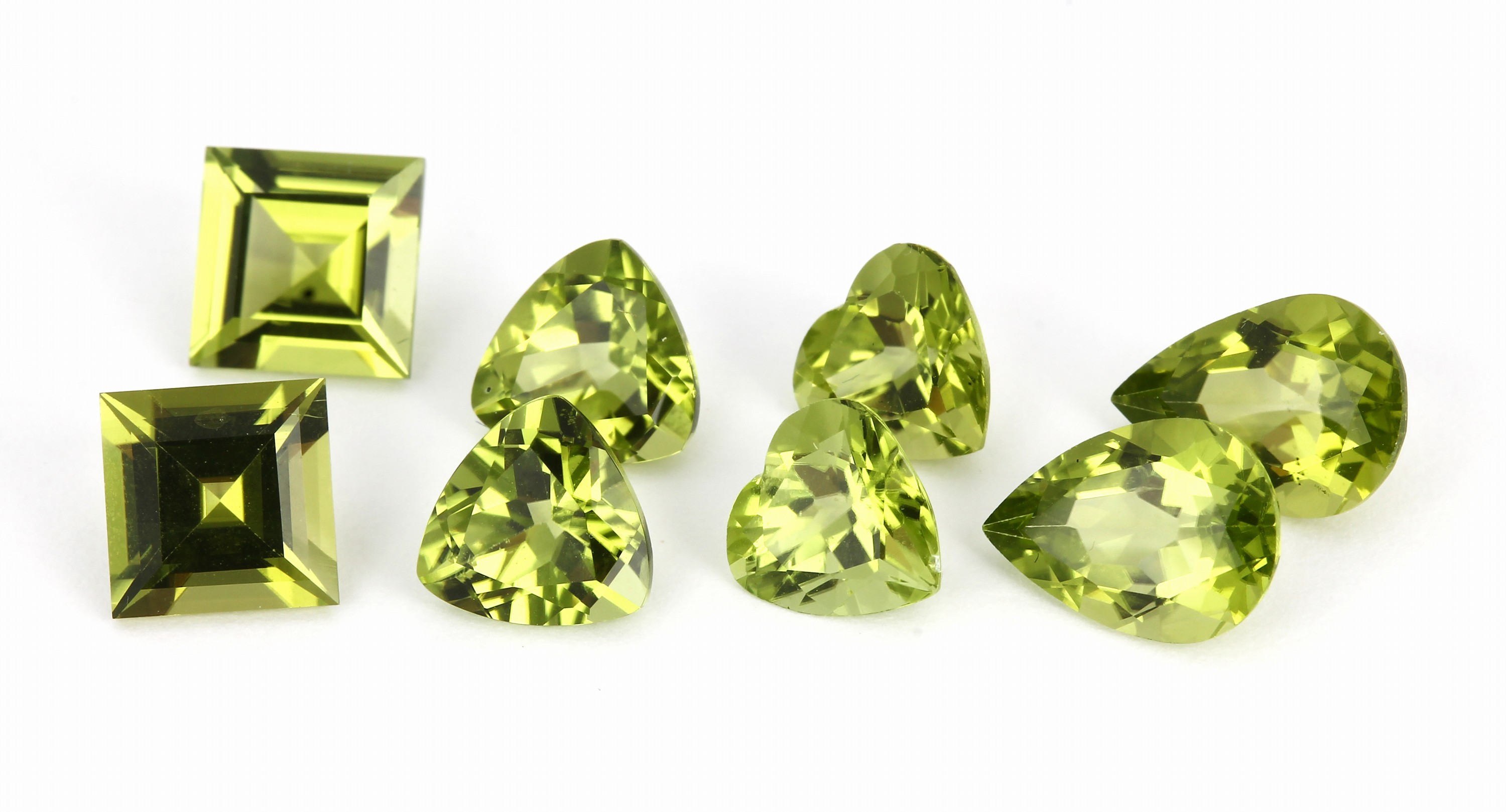 Detail a: Lot 8 lose Peridots, ca. 12.46 ct, versch. Schliffformen