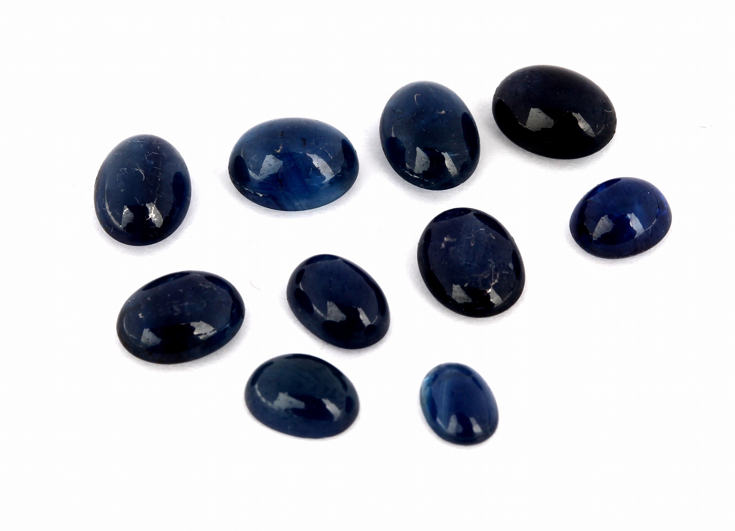 Lot 10 lose Saphire, ca. 16.40 ct, ovale Cabochons in versch. Größen
