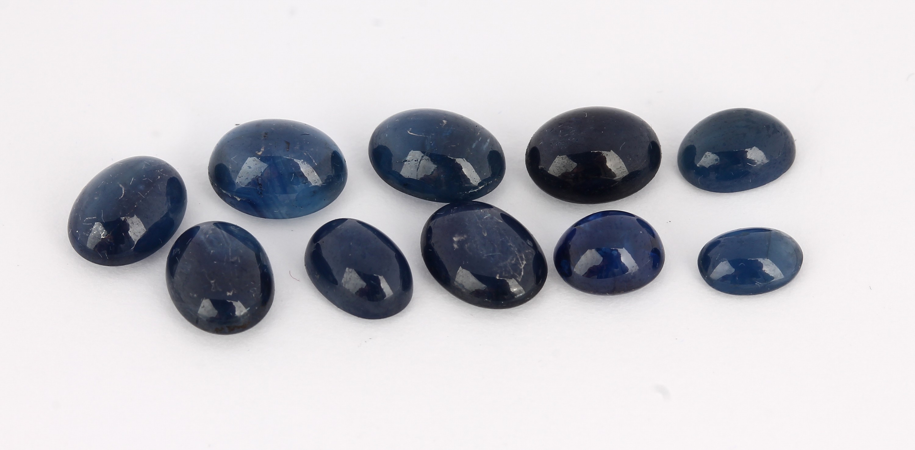 Detail a: Lot 10 lose Saphire, ca. 16.40 ct, ovale Cabochons in versch. Größen