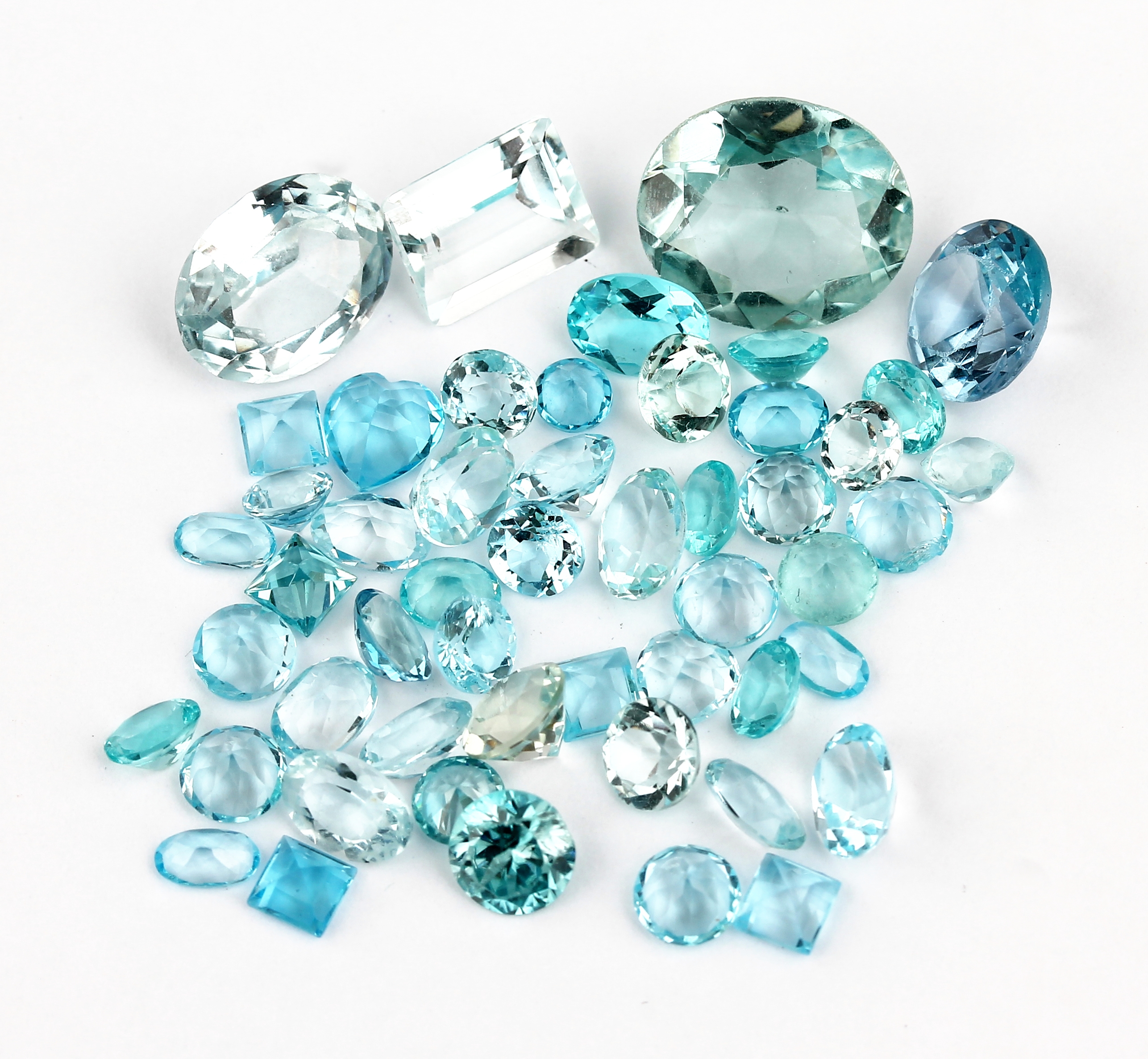 Loser Topas, ca. 55.36 ct, ovalfacett., dazu Farbsteine und Synthesen, u.a. Mondstein,Aquamarin, Citrin, Granat und Amethyst, versch. Schliffformen, ...