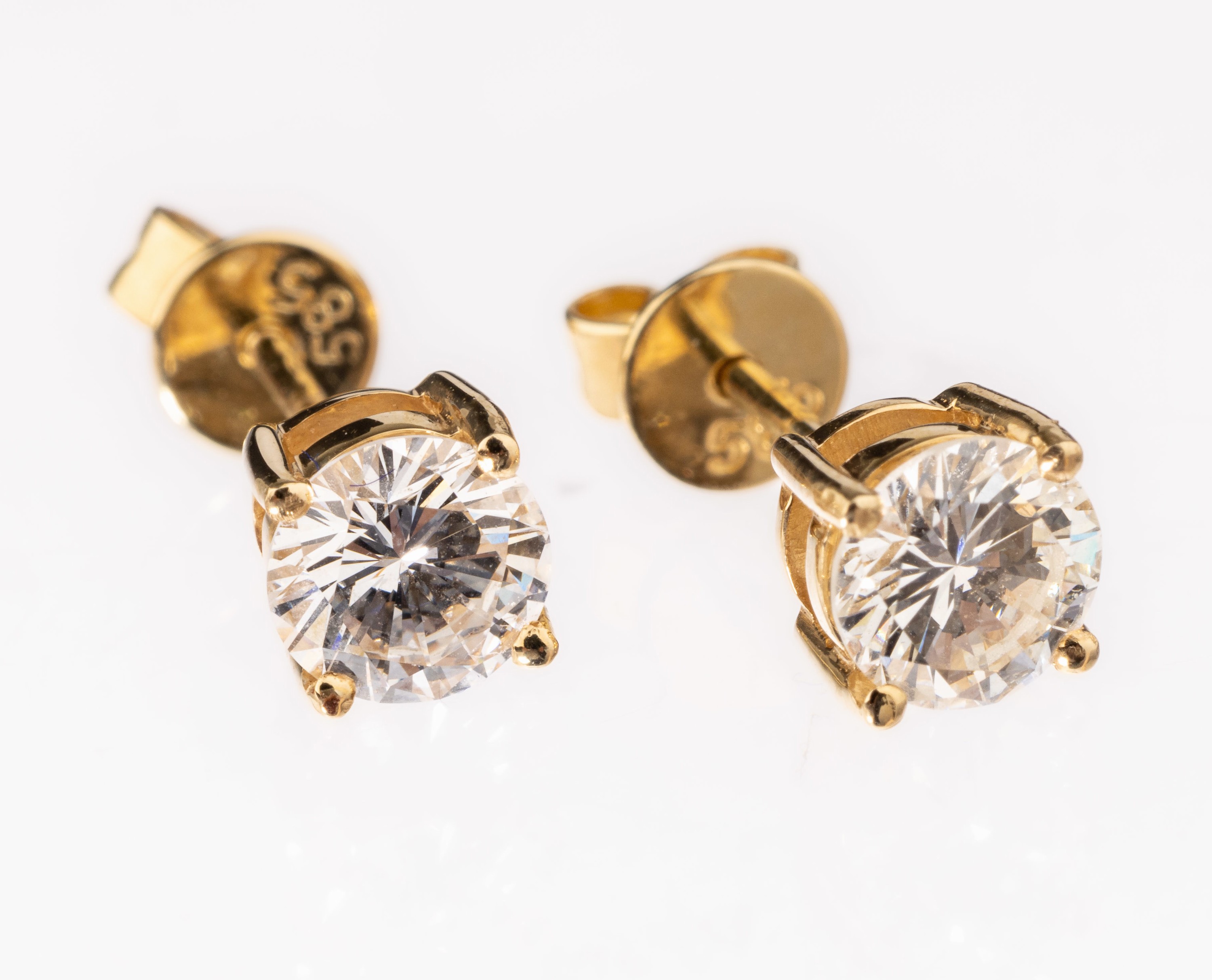 Paar 14 kt Gold Brillant-Ohrstecker, GG 585/000, 2 Brillanten zus. ca. 0.91 ct Weiß/vs-si