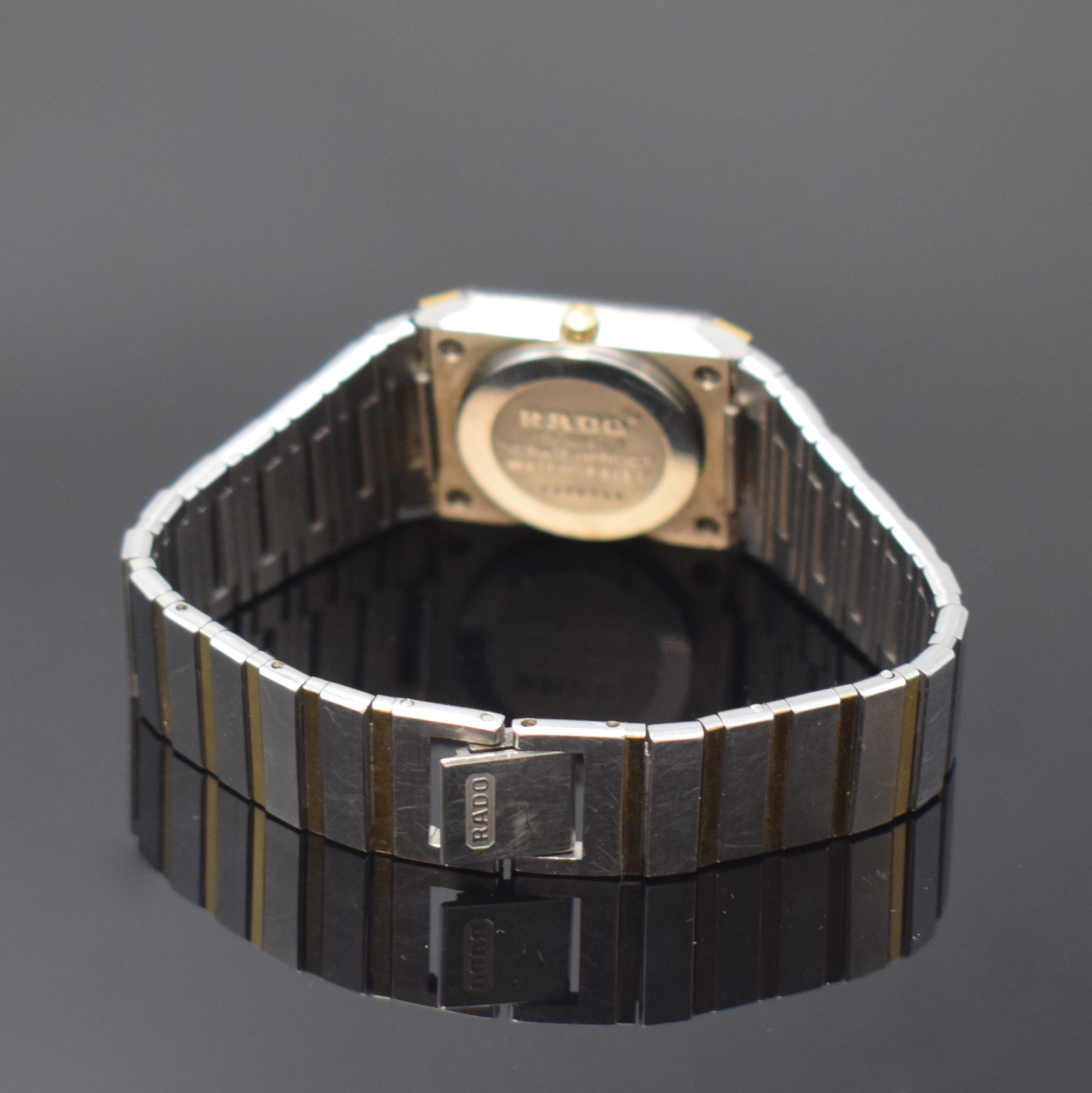 Detail b: RADO Jubile Damenarmbanduhr in Stahl/Gold Referenz 110.0197.3, Schweiz um 2000, quarz, orig. Gliederband, Boden aufgedr., schwarzes Zifferbl. m. 4 ...