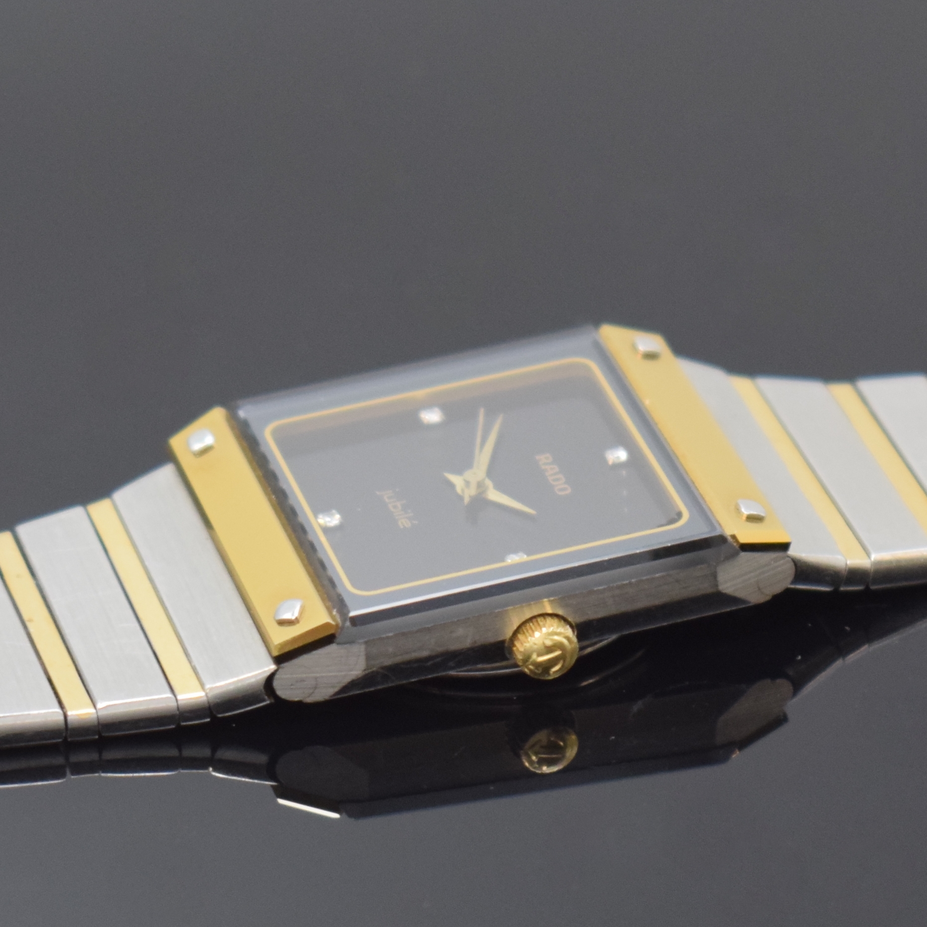 Detail c: RADO Jubile Damenarmbanduhr in Stahl/Gold Referenz 110.0197.3, Schweiz um 2000, quarz, orig. Gliederband, Boden aufgedr., schwarzes Zifferbl. m. 4 ...