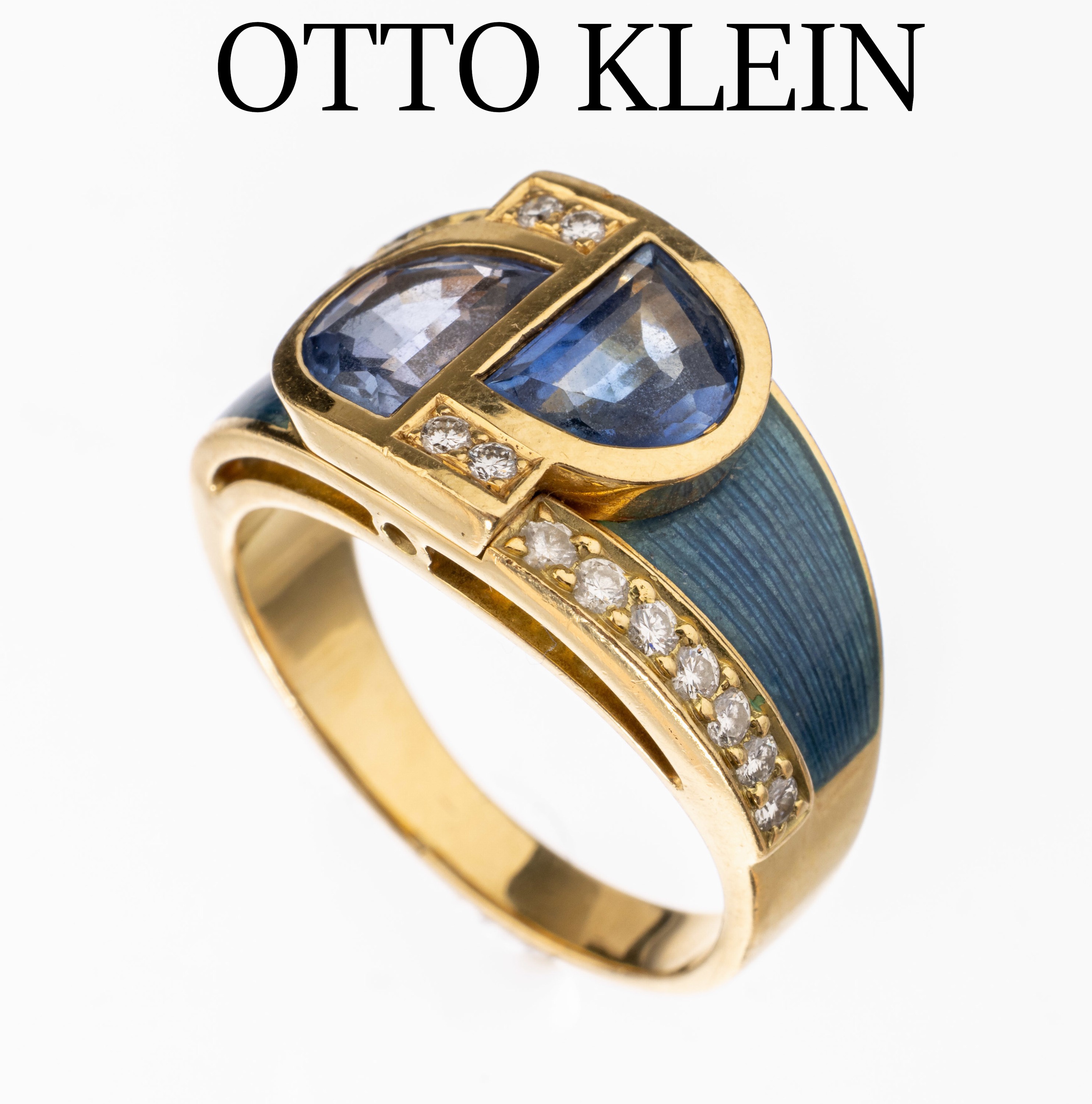 18 kt Gold Tansanit-Brillant-Ring, WG 750/000, Meistermarke OTTO KLEIN, Hanau, 2 eingeschliffene Tansanite zus. ca. 1.50 ct, 18 Brillanten zus. ca. ...
