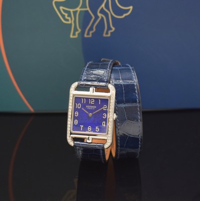 Image 26766824 - HERMES wristwatch series Cape Cod reference CC3.730, quartz, stainless steel case including original leather strap with original buckle, case back screwed-down 4- times, case at the sides with diamonds, lapis lazuli-dial with Arabic numerals, silvered hands, measures approx. 40,5 x 29 mm, Hermes storage back enclosed, unworn stock, condition 1-2