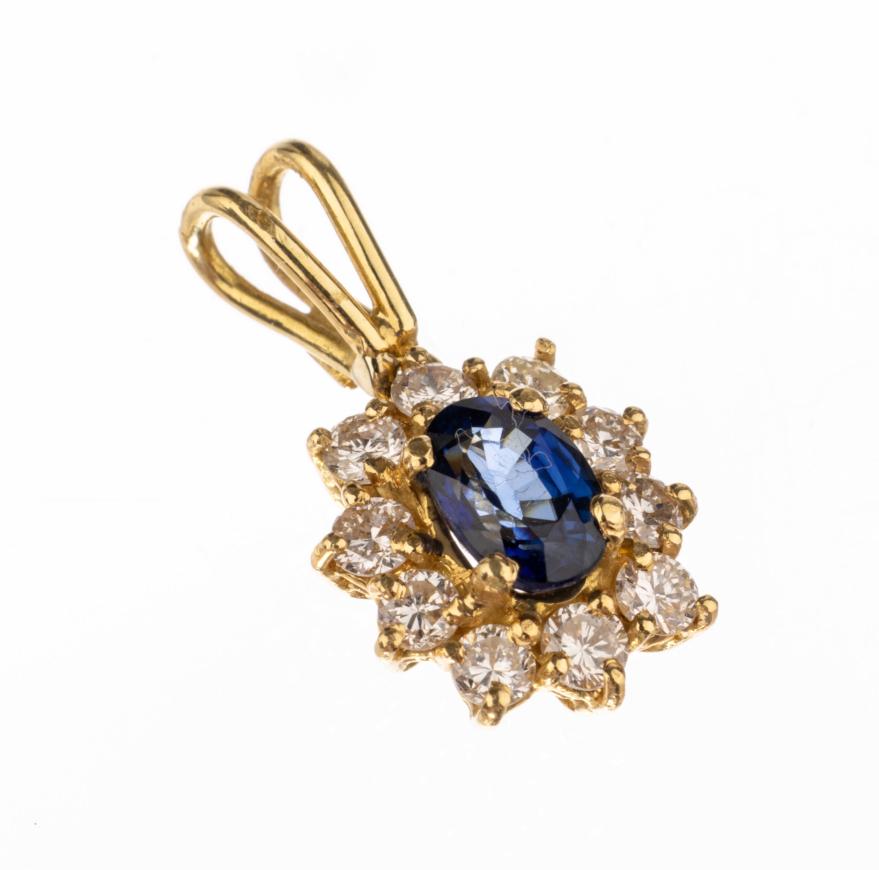 18 kt Gold Saphir-Brillant-Anhänger, GG 750/000, ovalfacett. Saphir ca. 0.30 ct, 10 Brillanten zus. ca. 0.50 ct feines Weiß -Weiß/lr-si, L. ca. ...