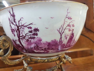 26768048e - Magnificent bowl on a bronze stand, Meissen, painting probably Bonaventura Gottlieb Häuer, around 1745/50, porcelain, camaieu painting in purple, pastoral landscape all around, inside base with picture cartouche, masterly depth perspective, gold edges, gold-plated bronze fittings, mouth edge restored, D. 15.5 cm, slight traces of age