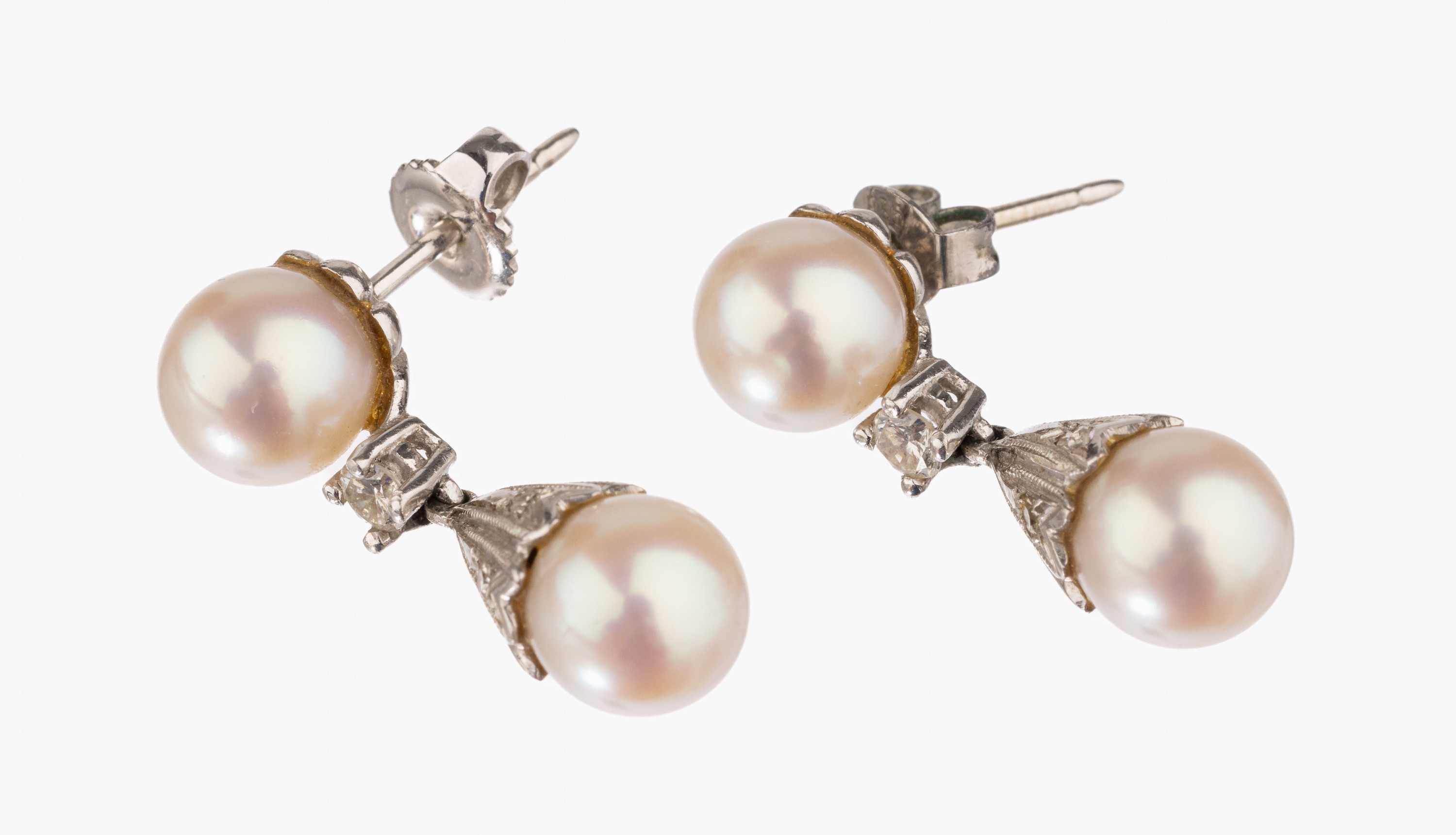 Paar 14 kt Gold Akoyazuchtperl-Diamant Ohrstecker, WG 585/000, 4 leicht rosef. Perlen, D. ca. 7 mm, 2 Brillanten zus. ca. 0.10 ct Weiß/si, weitere ...