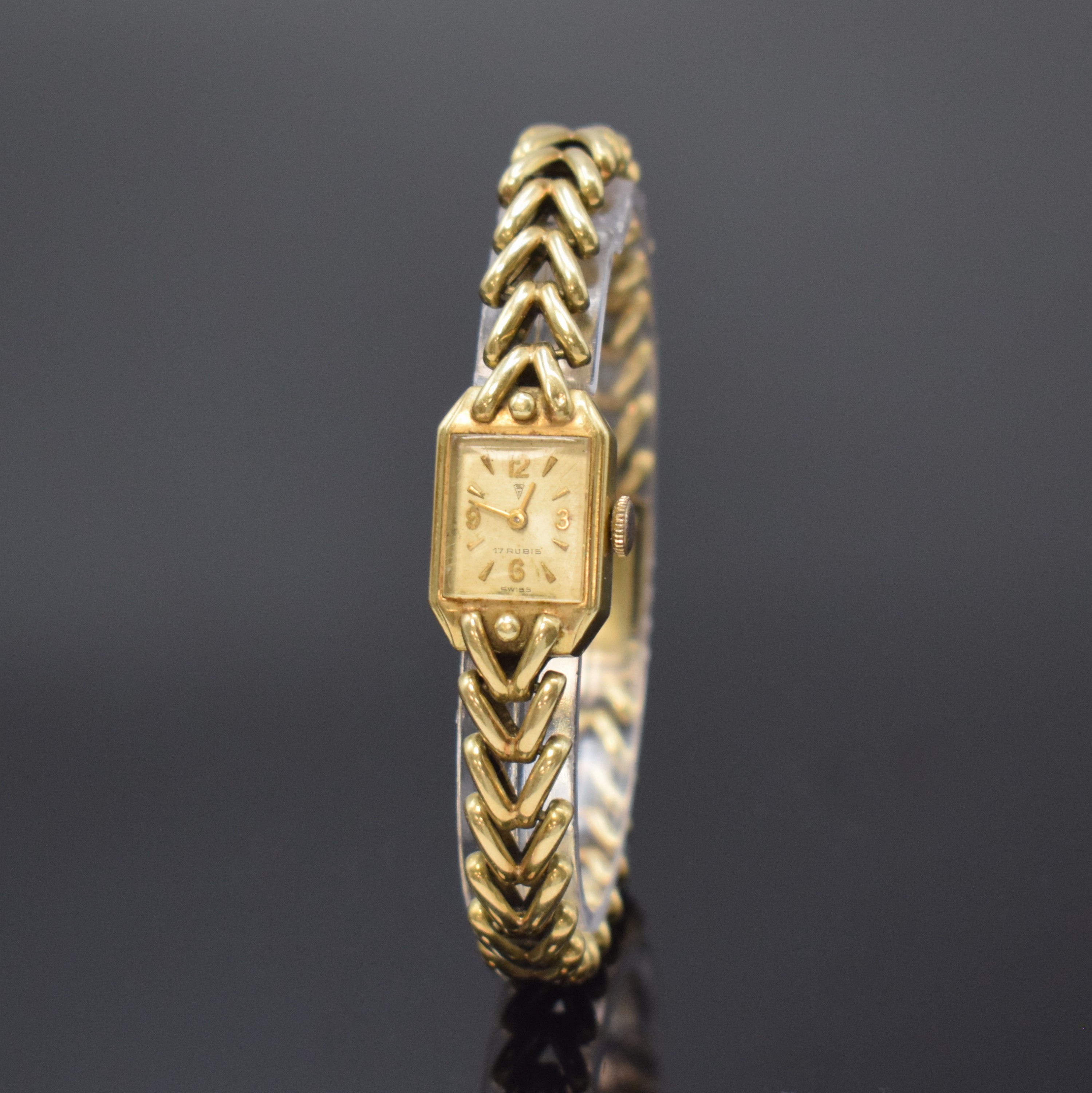Damenarmbanduhr in GG 585/000, Schweiz um 1955, Handaufzug, Boden aufgedr., Zifferbl. m. aufges. Indizes altersbed. fl., 17 St., Kal. AS 1051, ...