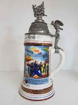 26768692d - 4 reservist steins, 1 of Nassau Field Artillery Regiment Frankfurt, 1 of Infantry Regiment Freiburg i.Br., 1 if Guard Field Artillery Regiment Berlin, 1 of Baden Infantry Regiment Mühlhausen, 1901-1913, porcelain, polychrome lithographed and painted, Lithophane in the base, tin lid with figurative attachment, Mühlhausen 1911-13 with hairline crack, signs of age, height approx. 28 cm