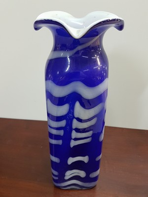 26768732c - Glass vase, Bohemia, around 1910, blue glass with white interior overlay, melted milk- white wave decoration, four-fold cut-out mouth, without mark, height 27 cm
