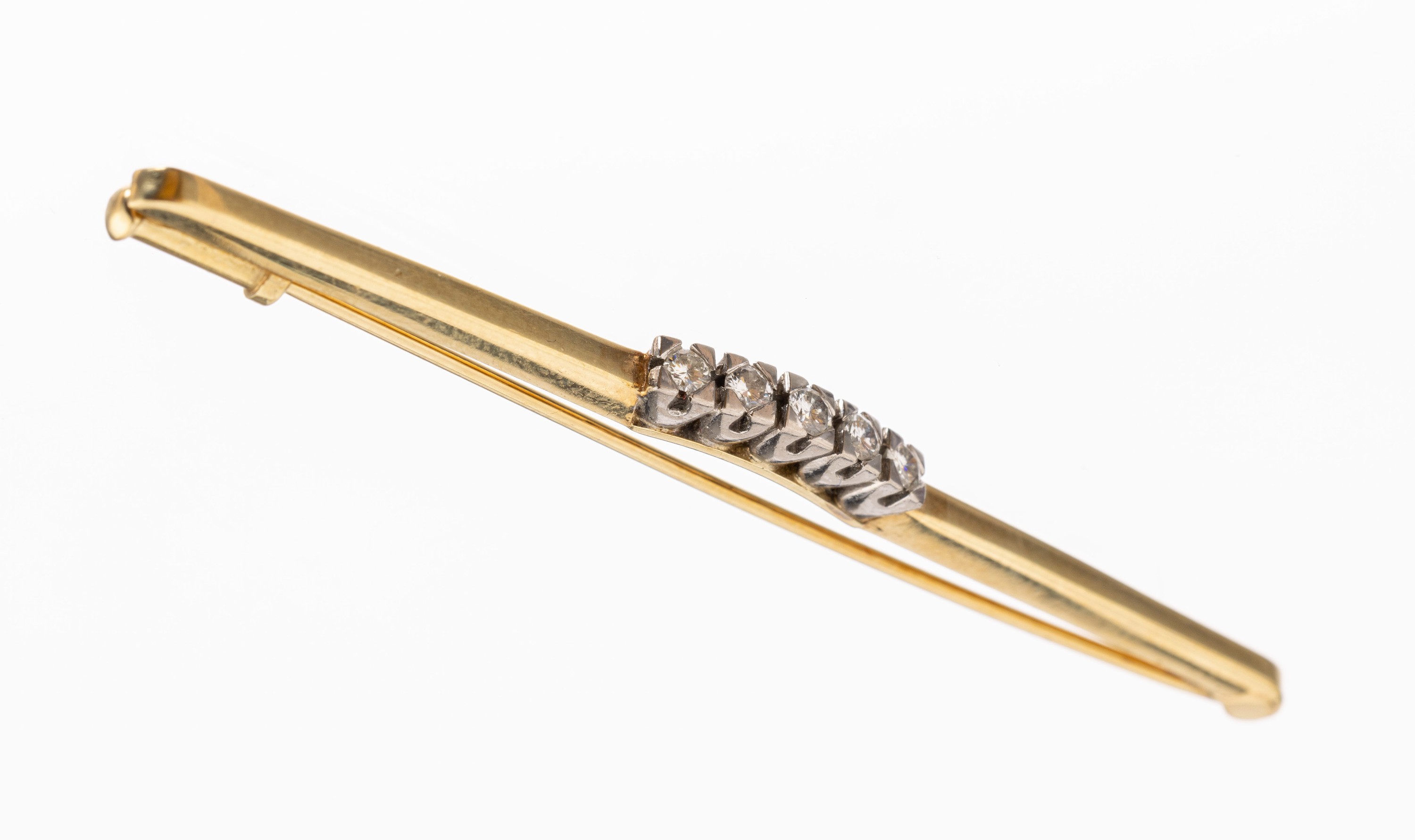 14 kt Gold Brillant-Brosche, GG/WG 585/000,L. ca. 6.5 cm, 5 in WG gefasste Brillanten zus. ca. 0.24 ct Weiss/si, ca. 4.3 g