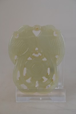 26769211b - 2 pendants made of jade, China, 19th century, jade, partly openwork, approx. 5.5x4 cm