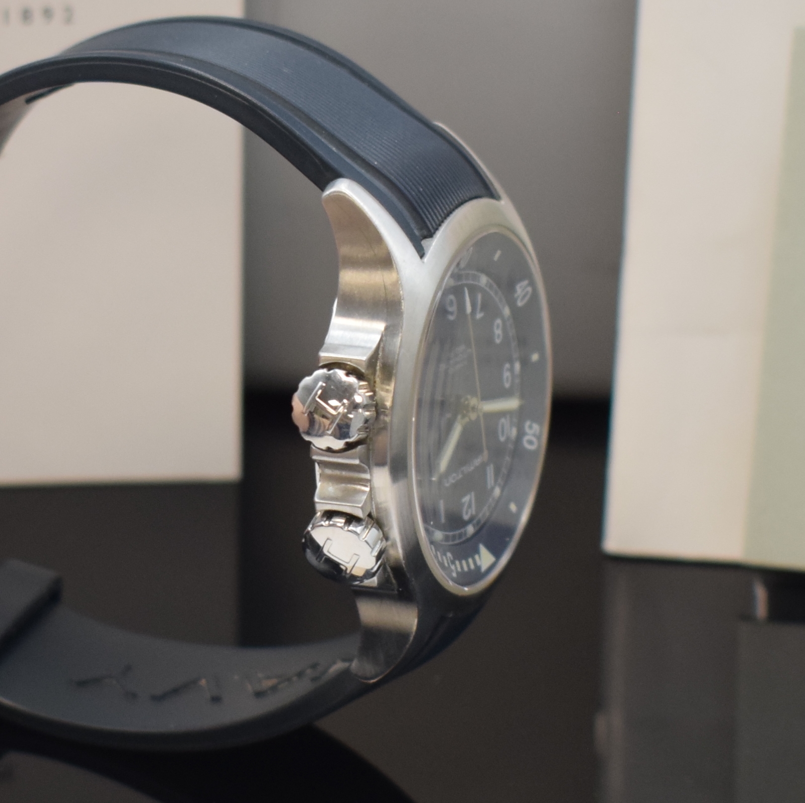Detail c: HAMILTON Herrenarmbanduhr Khaki Navy Referenz H77151, Schweiz um 2009, Edelstahlgeh. inkl. orig. Kautschukband m. orig. Dornschl., Boden und Kronen ...