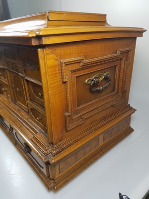 26769341l - Model cabinet cupboard, South German, 18th century, oak veneer, lid with drawer, behind it a lock for the lid drawer, old lock and fittings, former 2-door front is missing, 6 drawers, Renaissance decor, drawers mainly lined with marble paper, restored, 4 secondary feet, 29x36x26 cm, 1 key available