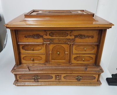 26769341n - Model cabinet cupboard, South German, 18th century, oak veneer, lid with drawer, behind it a lock for the lid drawer, old lock and fittings, former 2-door front is missing, 6 drawers, Renaissance decor, drawers mainly lined with marble paper, restored, 4 secondary feet, 29x36x26 cm, 1 key available