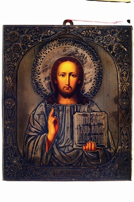 26769364k - Icon with silver oklad, Christ as Pantocrator,Russia, end of 19th century, oil/wood, silver oklad marked 84 Zolotniki and dated 1879, velvet cover on the reverse, age marks. 26.5x22cm