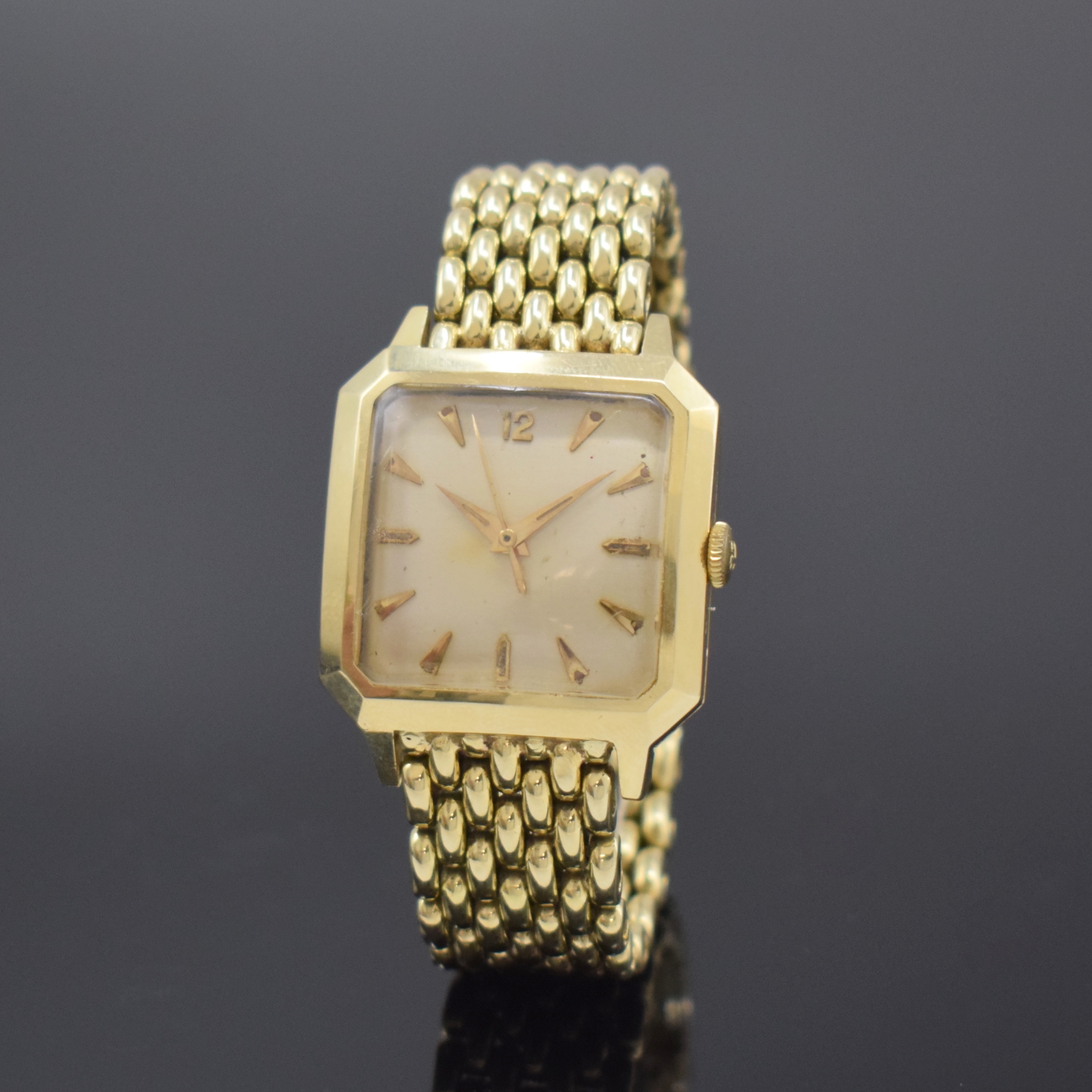 ZENTRA schwere Herrenarmbanduhr in GG 585/000, Automatik, System von Felsa BIDYNATOR, Kal. 690, Schweiz um 1955, Boden aufgedr., silb. Zifferbl. m. ...