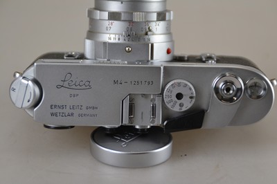 26769546e - Leica M4, #1251793 built in 1970, plus two lenses: Summicron 50mm 1:2 with close-up lens and Elmar 90mm 1:4; Leica Meter MR, original leather case; signs of wear; Shutter speeds not checked