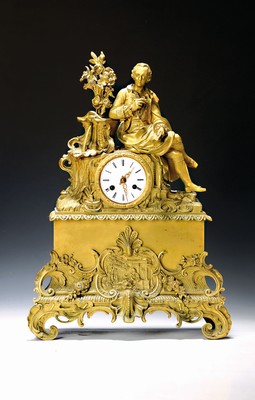 Image 26771433 - Pendulum, France, around 1850, richly decorated bronze case, in the base a woman writing in front of at ancient temple in a landscape, figure crowning of a poet in the Rococo next to a stylized fountain with floraldecoration, enamel dial (minor dam.), pendulummovement illegibly marked: Schet Bau....Paris ), converted to a pendulum spring, half-hour strike on the bell, pendulum (sun) not included, key missing, height approx. 54cm, condition of movement/housing 3