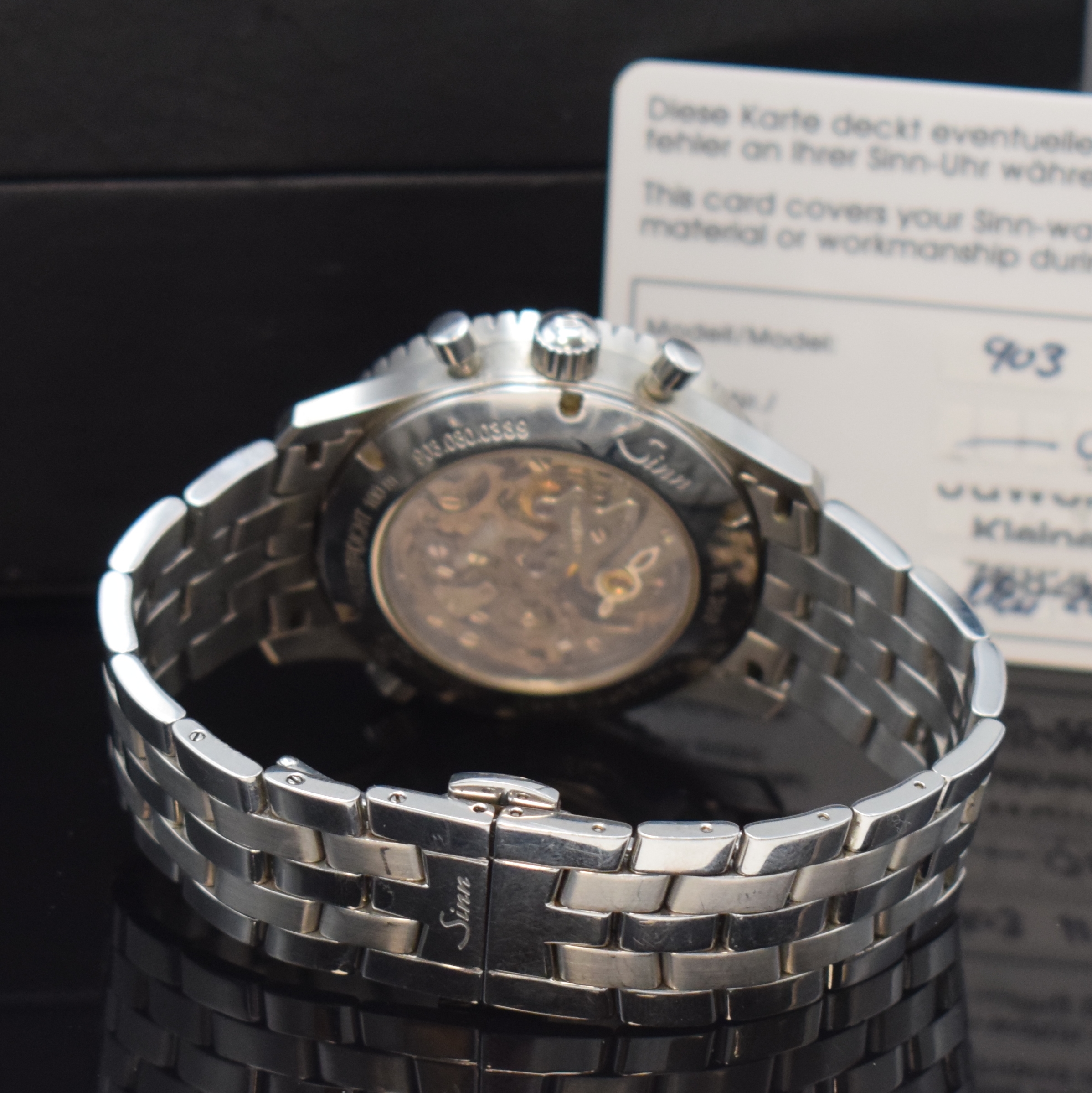 Detail b: SINN 903 H4 Herrenchronograph mit Mondphase in Stahl, Schweiz verk. lt. beil. Garantie 05/2008, Handaufzug, beids. vergl. Geh., Boden verschr., orig. ...