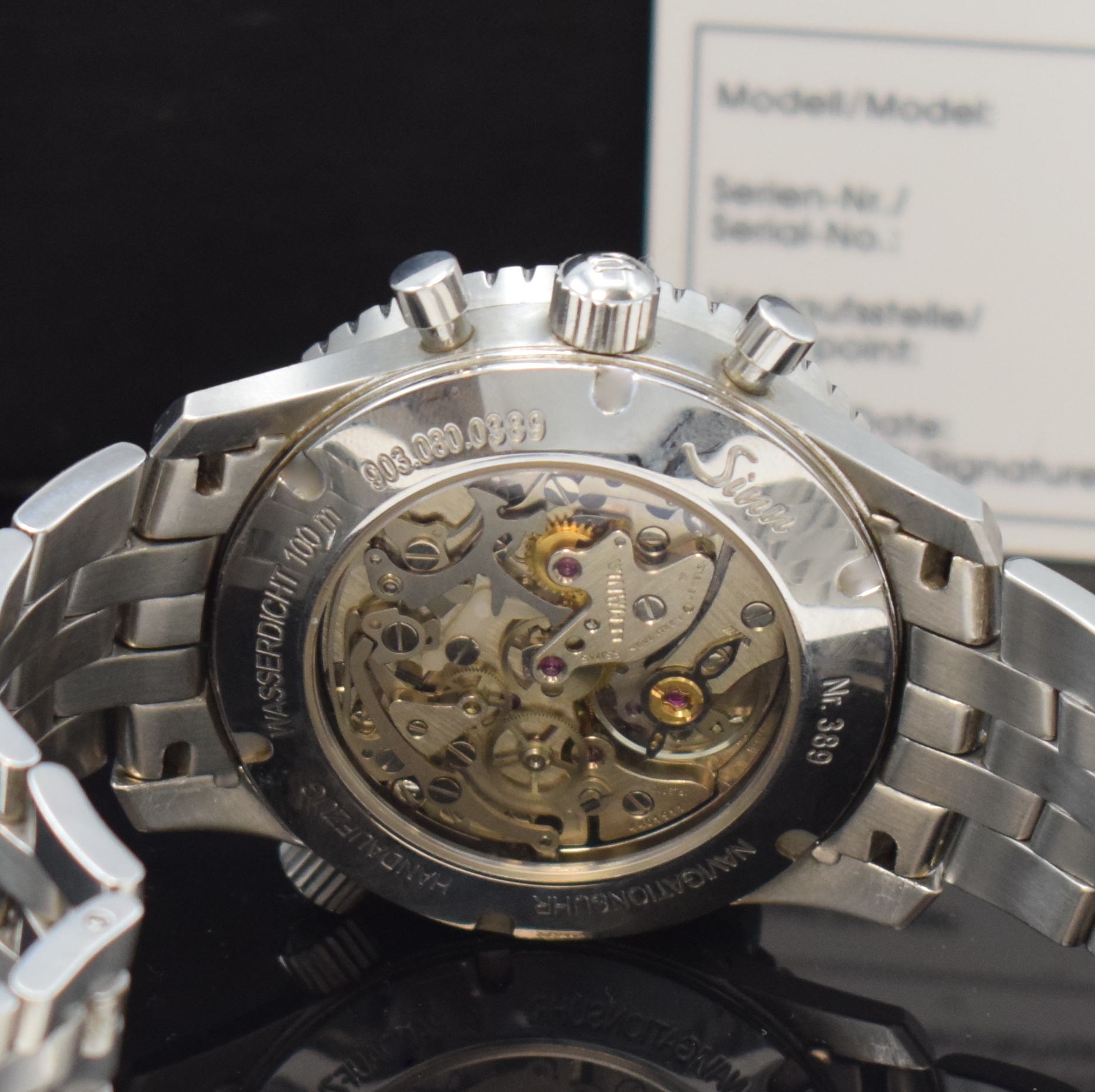 Detail e: SINN 903 H4 Herrenchronograph mit Mondphase in Stahl, Schweiz verk. lt. beil. Garantie 05/2008, Handaufzug, beids. vergl. Geh., Boden verschr., orig. ...