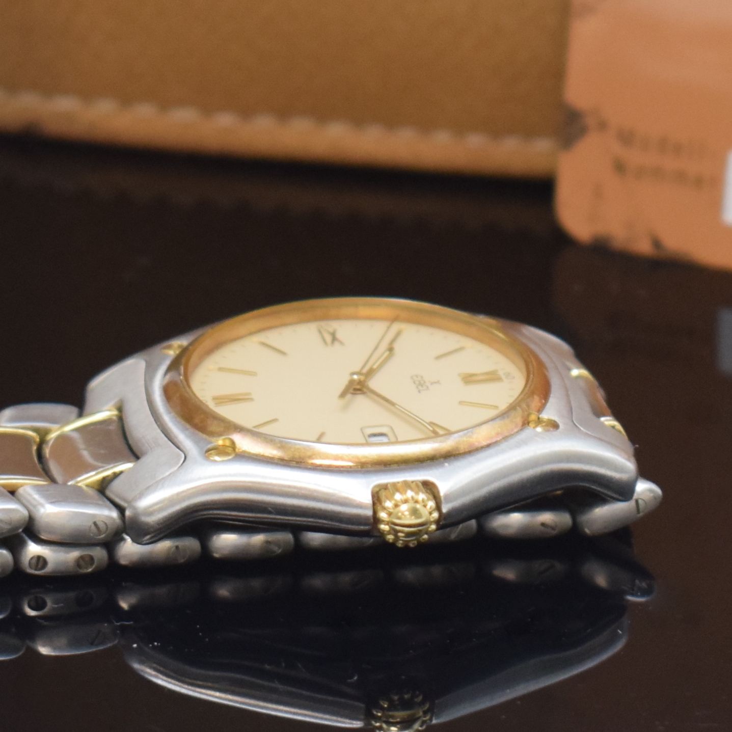 Detail c: EBEL Armbanduhr Serie 1911 Referenz 187902, quarz, Edelstahlgeh. inkl. Gliederband m. Faltschl., 18k Goldlünette gegen Geh. 5-fach verschr., 8-fach ...