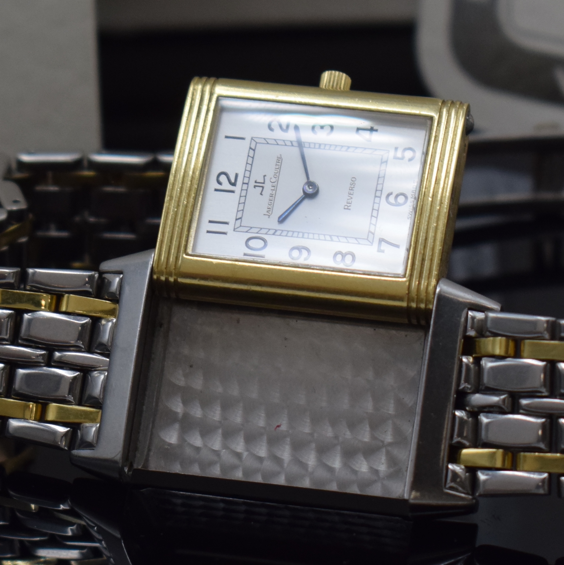Detail e: Jaeger-LeCoultre Armbanduhr Reverso Classique Referenz 250.5.86 in Stahl/Gold, Schweiz verk. lt. beil. Zertifikat 11/1994, Handaufzug, um 180 Grad ...
