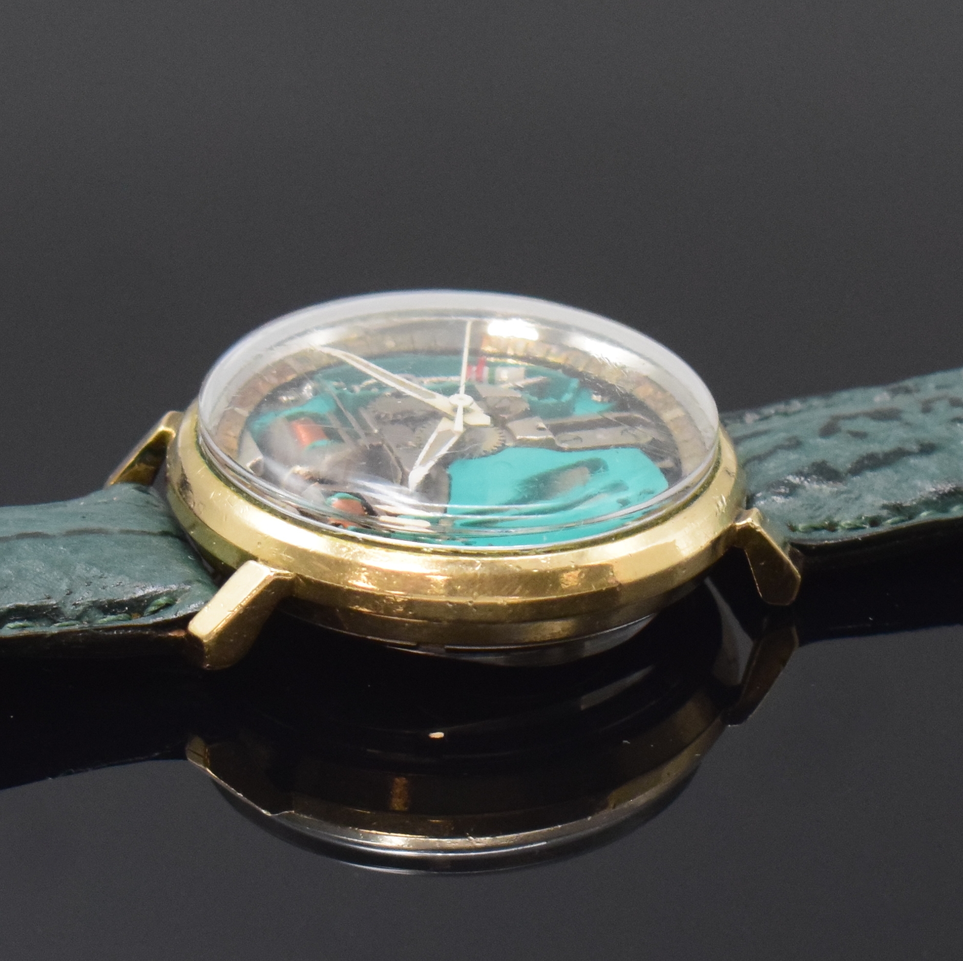 Detail b: BULOVA Herrenarmbanduhr Accutron Spaceview, Schweiz um 1968, Edelstahlgeh., Boden verschr., sichtbares Stimmgabelschwingerwerk, Leuchtzeiger, ...
