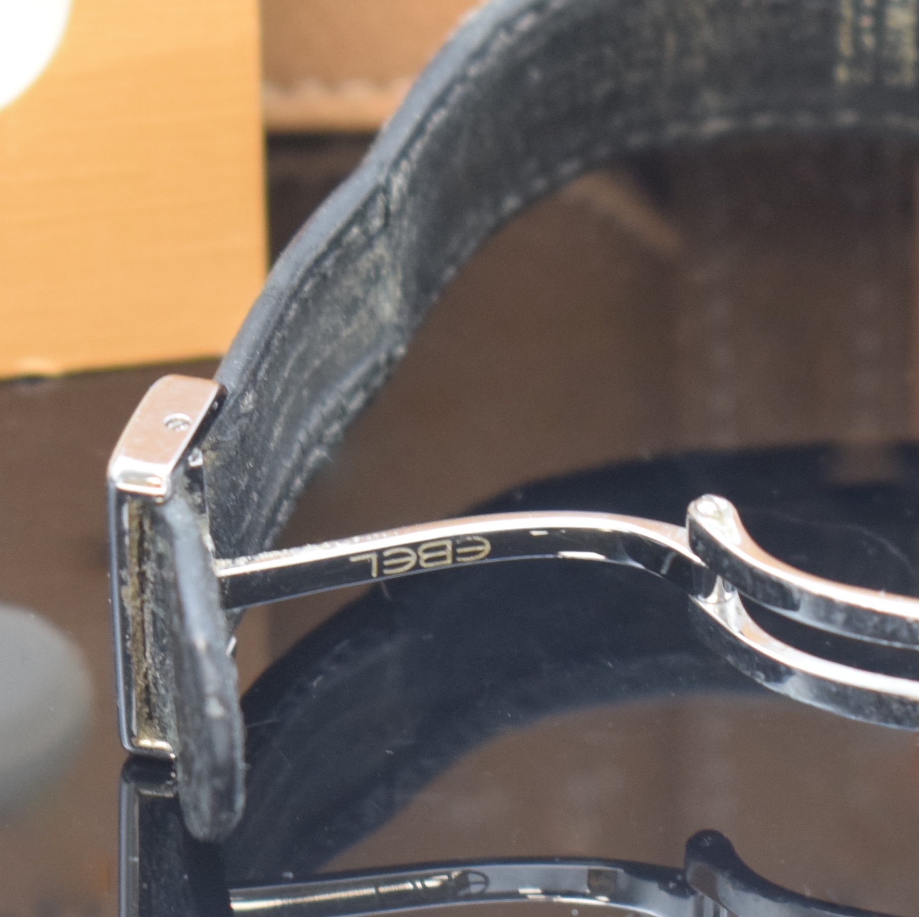 Detail b: EBEL 1911 Herrenarmbanduhr in Stahl Referenz 993902, Schweiz verk. lt. beil. Pap. 08/1994, Automatik, Boden 8-fach verschr., orig. Lederband m. ...