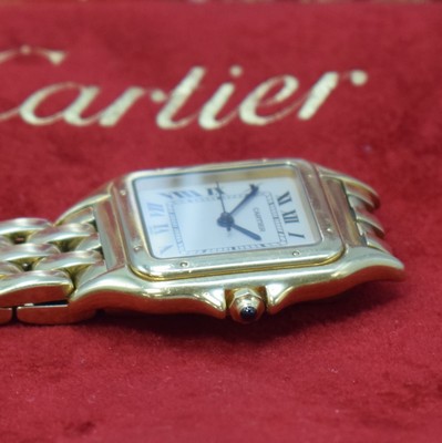 26773894c - CARTIER Panthere wristwatch in 18k yellow gold, Switzerland sold according to papers in June 1995, quartz, two-piece construction case, back with 8 screws, original bracelet with butterfly buckle, silvered dial with Roman numerals, blued steel hands, date, measures approx. 38 x 29 mm, length approx. 18 cm, papers and service-box enclosed, condition 2-3