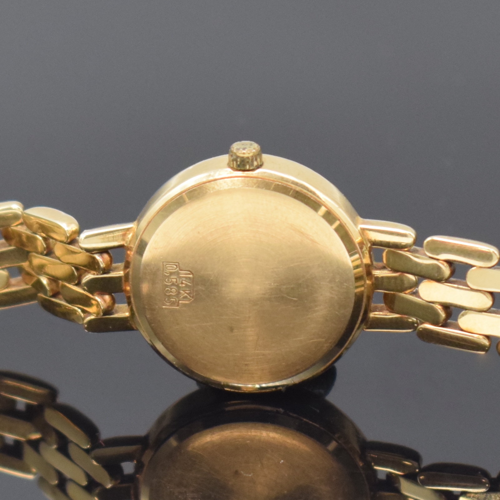 Detail c: GENEVE Damenarmbanduhr in GG 585/000 mit Diamanten, Schweiz um 1975, quarz, Boden aufgedr., Lünette mit Diamanten bes., champagnerfarb. Zifferbl. m. ...