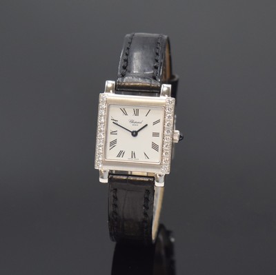 Image CHOPARD ladies wristwatch in white gold 18k with diamonds reference 426 1, quartz, case back screwed-down 4-times, original leather strap with buckle, jeweled crown, case at the sides lavish set with diamonds, white dial with Roman numerals, blued steel hands, measures approx. 22 x 22 mm, condition 2