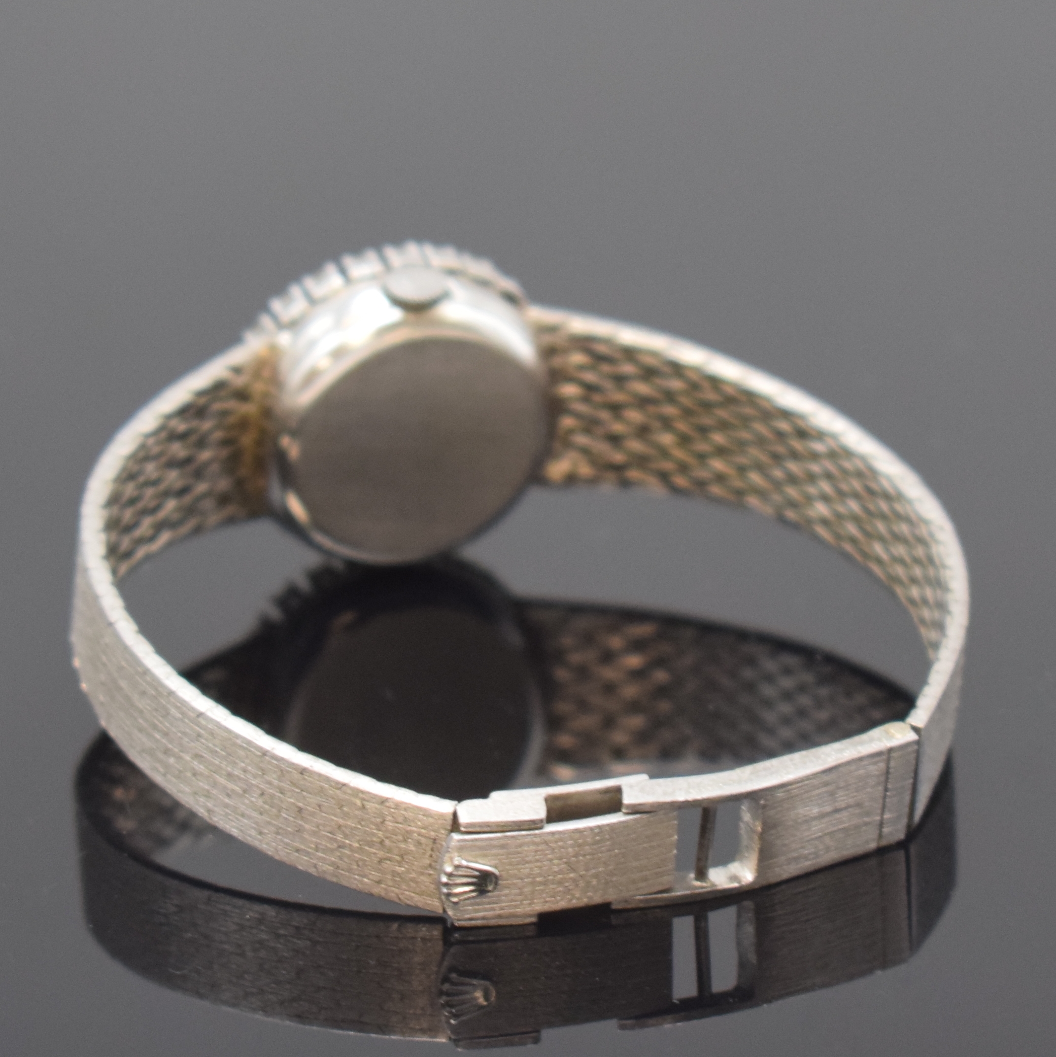 Detail b: ROLEX Damenarmbanduhr in WG 750/000 mit Diamanten, Schweiz 1960er Jahre, Handaufzug, Boden aufgedr., orig. Goldband, Lünette aufw. m. Diamanten ...