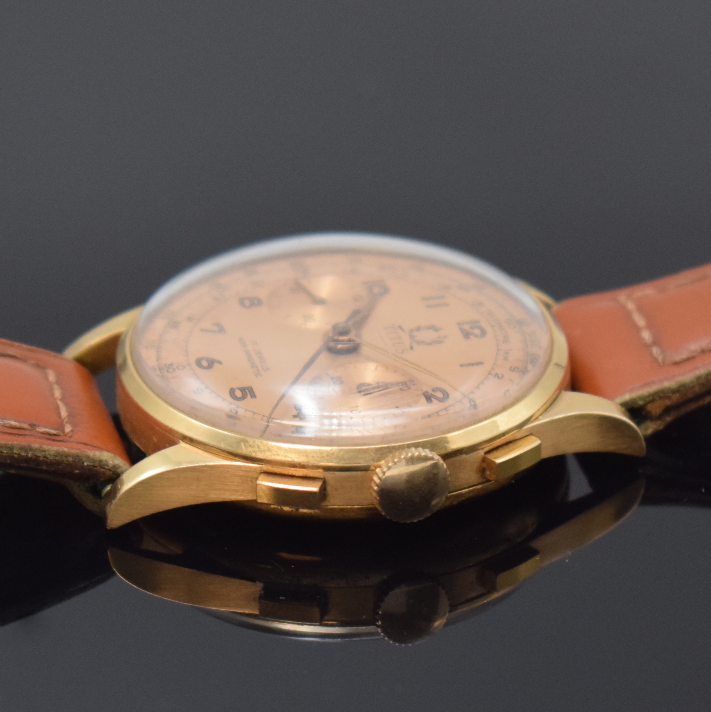 Detail b: TITUS Armbandchronograph in RoseG 750/000, Schweiz um 1950, Handaufzug, dell. Boden aufgedr., Metall-Innendeckel, kupferfarb. Zifferbl., arab. ...