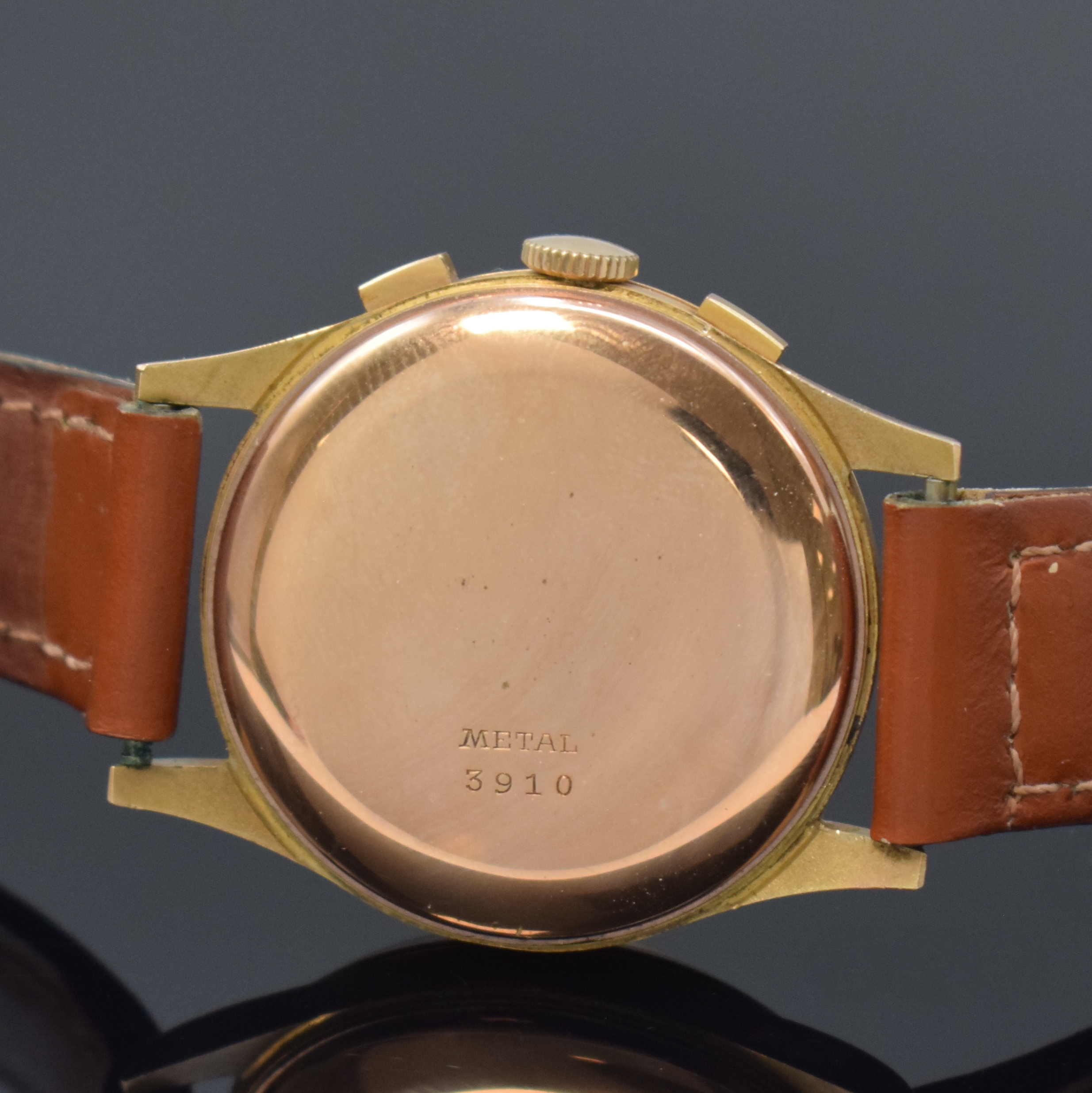 Detail e: TITUS Armbandchronograph in RoseG 750/000, Schweiz um 1950, Handaufzug, dell. Boden aufgedr., Metall-Innendeckel, kupferfarb. Zifferbl., arab. ...