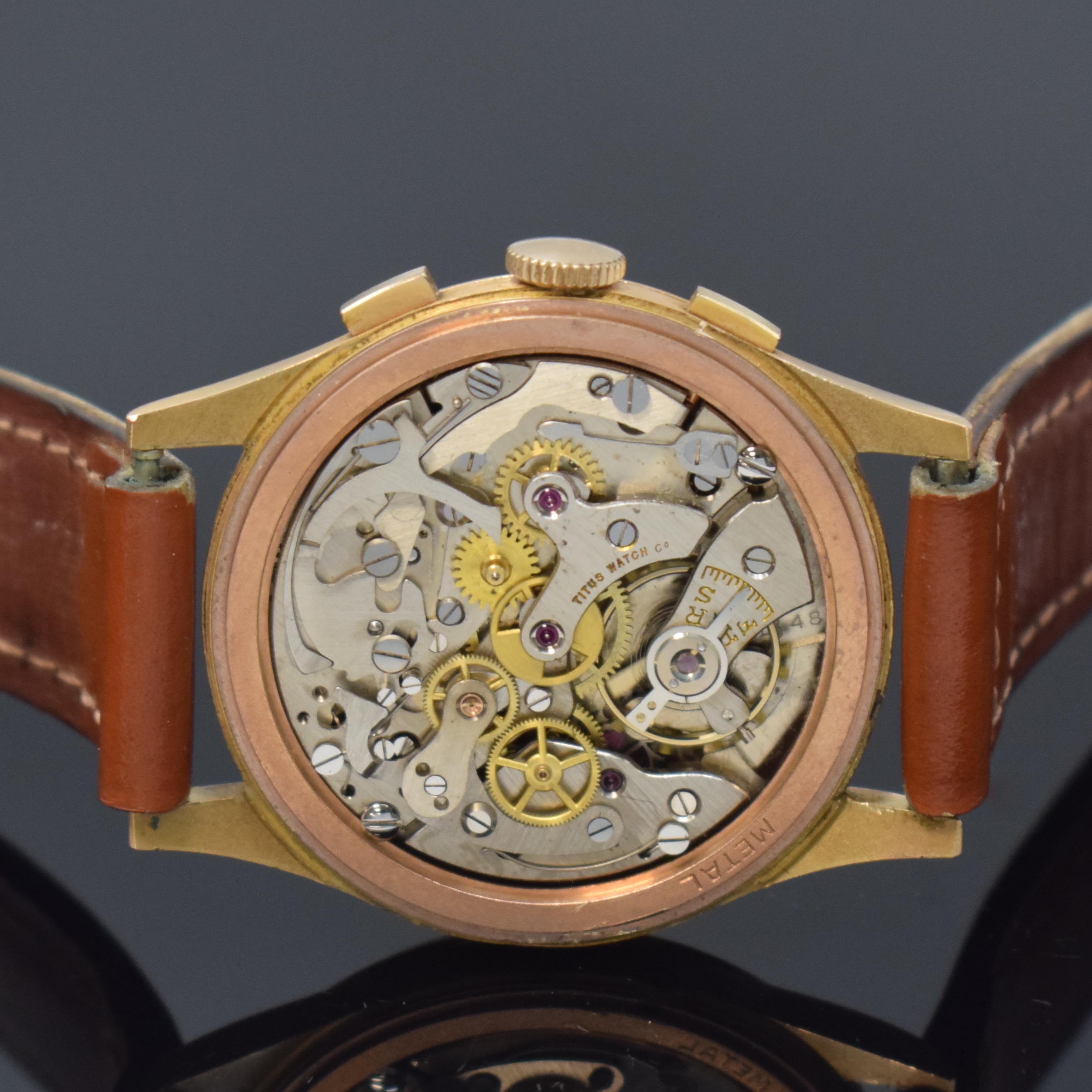 Detail f: TITUS Armbandchronograph in RoseG 750/000, Schweiz um 1950, Handaufzug, dell. Boden aufgedr., Metall-Innendeckel, kupferfarb. Zifferbl., arab. ...