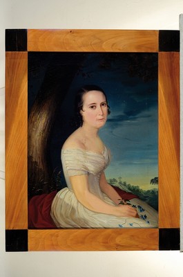 26775018k - Unidentified artist of the early 19th century, Biedermeier portrait around 1820, young woman with classicist white dress, background evening landscape with finely painted grasses, hands folded in lap holding gentian flowers, gentian as a symbol of purity and loyalty refers to the unmarried status of the depicted, oil/canvas, mounted on wood, flat, finely formed craquele, matching Biedermeier frame with ebonized corner gussets, 59x44 / 73x57 cm