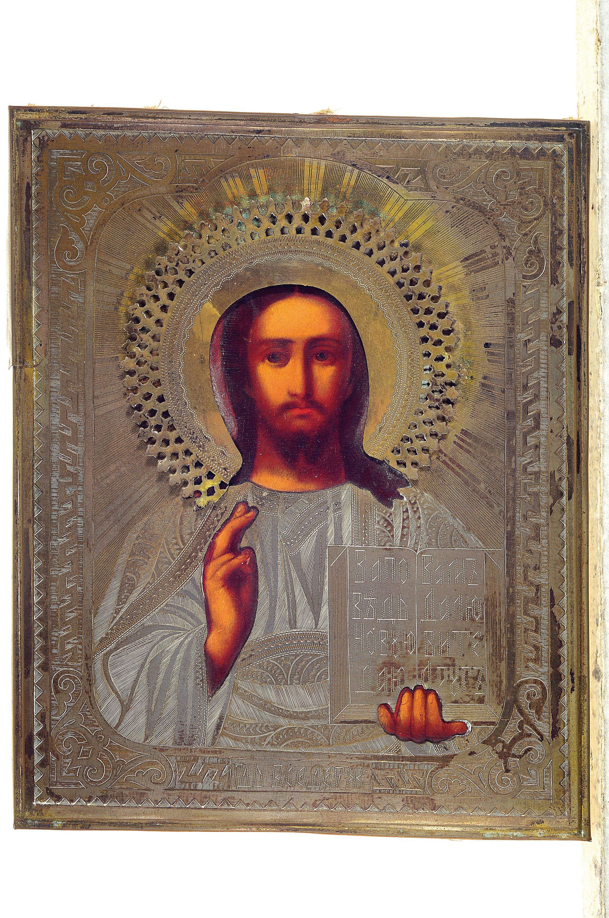 Detail k: Ikone, Russland, um 1900, Christus Pantokrator, Tempera auf Holz, vergoldetes Metalloklad reich ziseliert und guillochiert, ca. 22x18cm